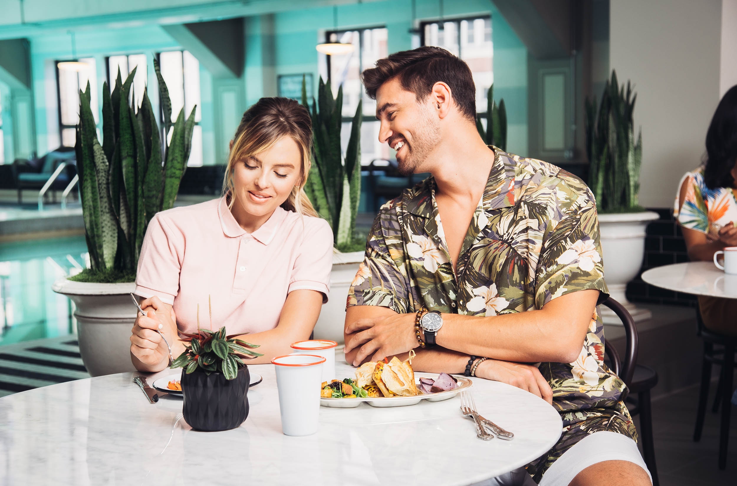 A couple enjoying a delicious meal together, creating lasting memories and savoring the joy of each other's company.