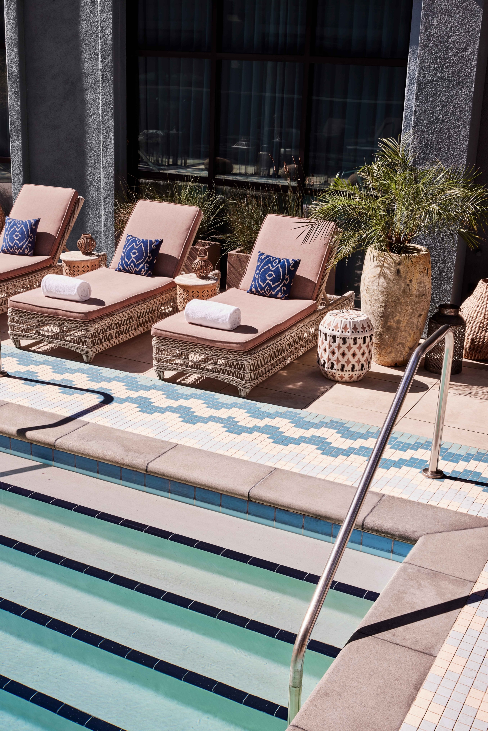 pool with lounge chairs